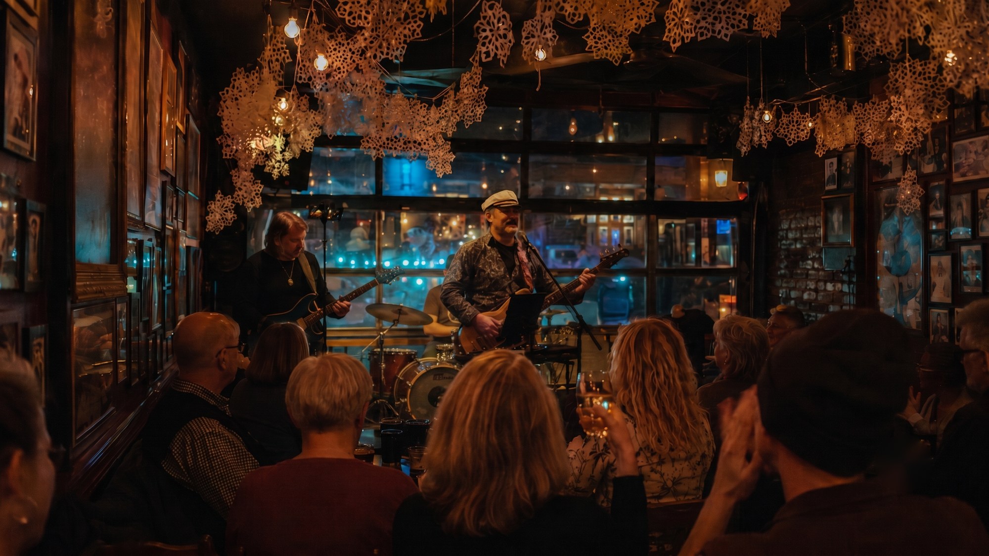 Live music at an intimate Beaches venue — band on stage, audience appreciating the moment